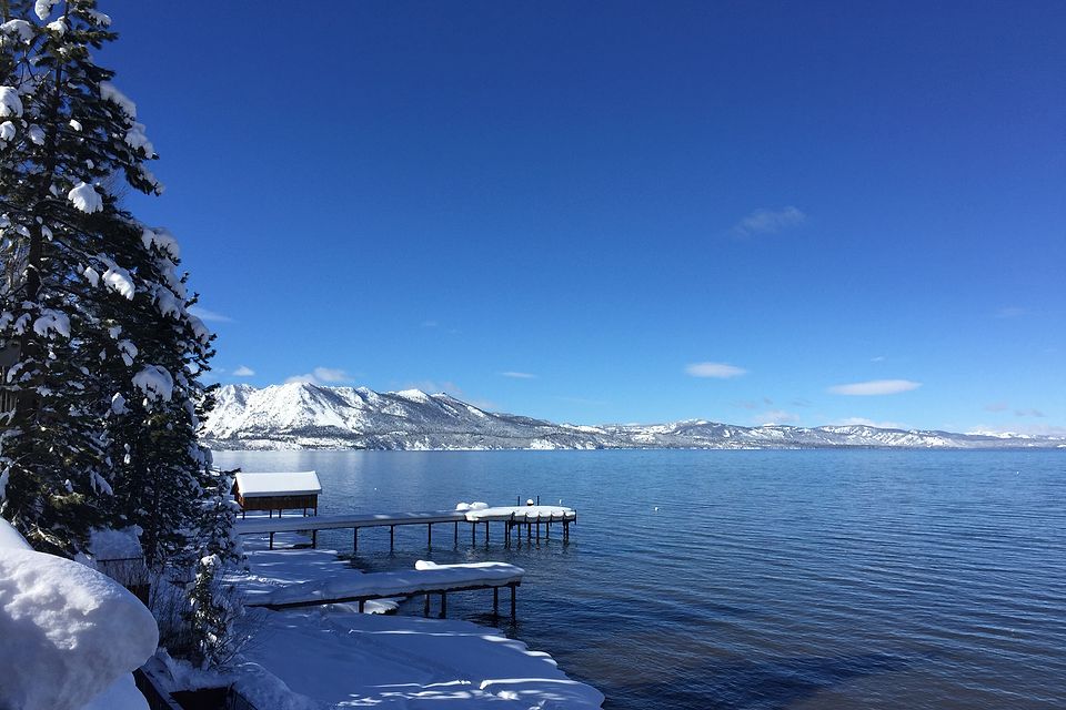 The lakefront and private dock under fresh snow