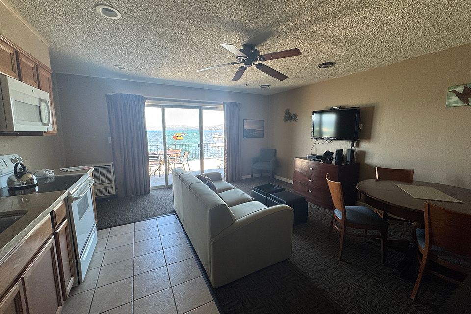 Kitchen and living room looking out at Lake Tahoe, Unit B at the Beachcomber Inn