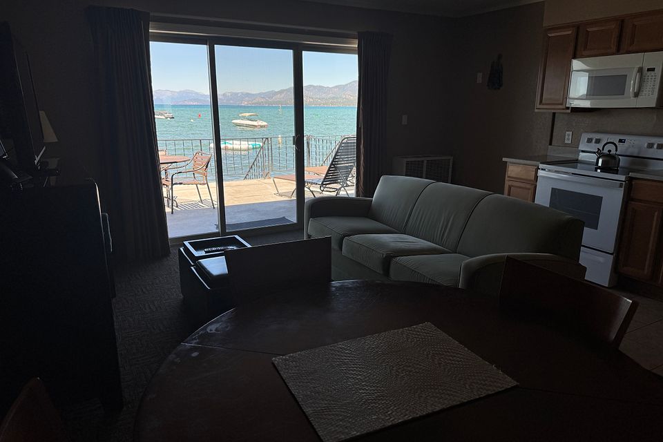 Living room with a Lake Tahoe view, Unit C at the Beachcomber Inn