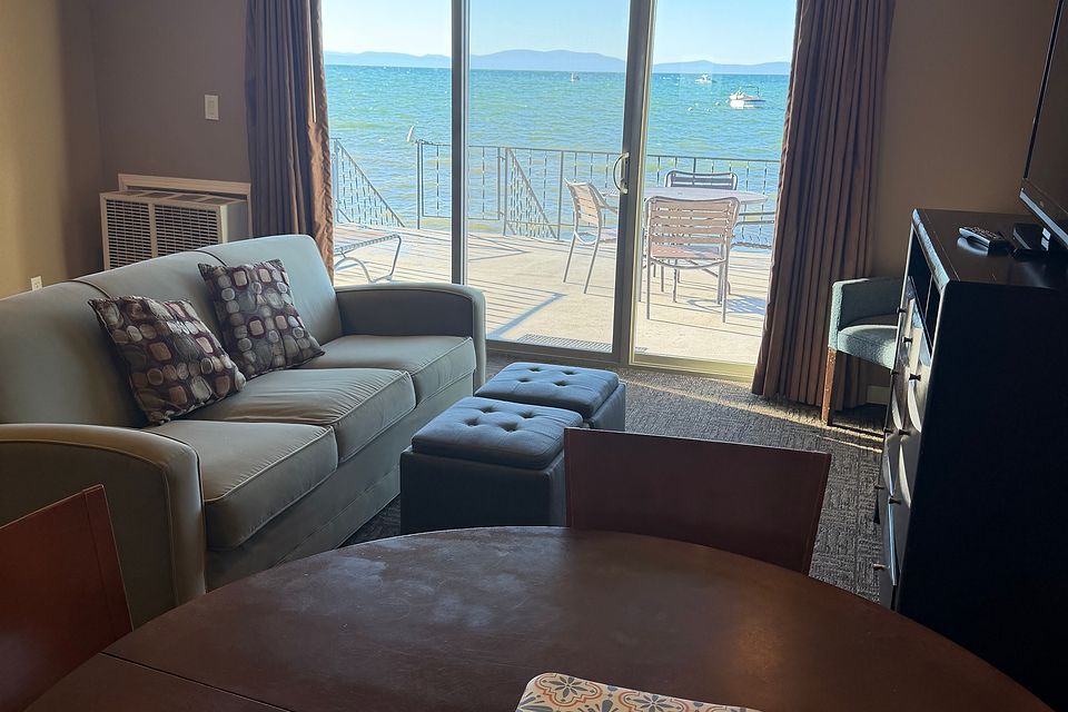 Living room with a queen sofa bed, Unit D