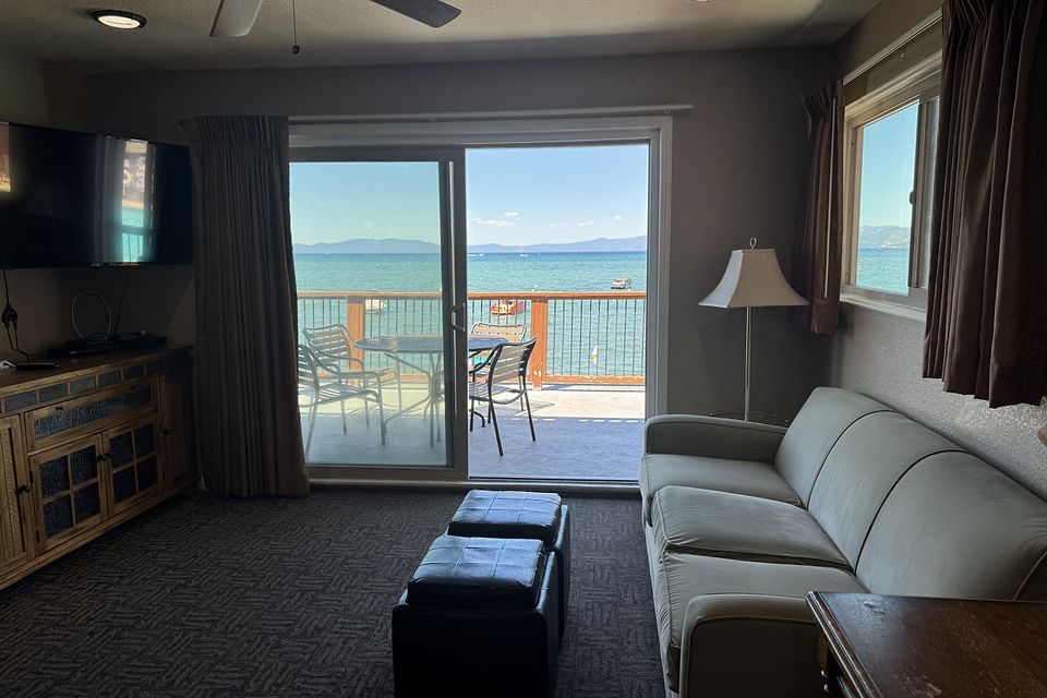 Living room with a Lake Tahoe view, Unit J at the Beachcomber Inn