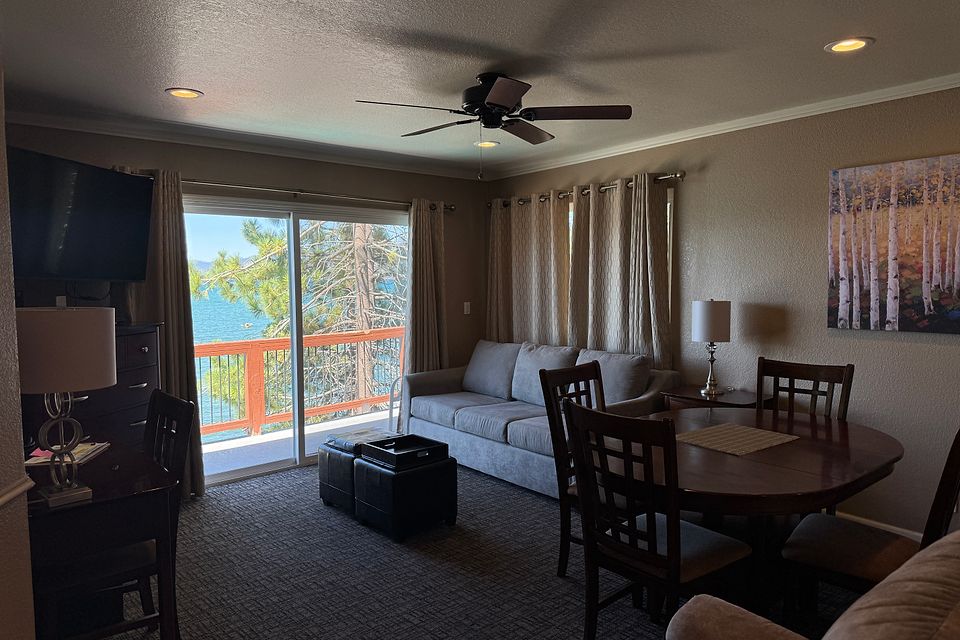Living room with a Lake Tahoe view, Unit T at the Beachcomber Inn